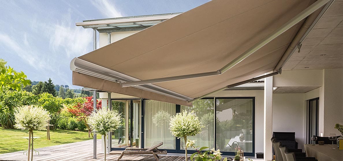 Retractable awning extended over residential patio