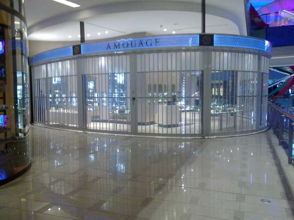 Side-folding closure installed on mall storefront