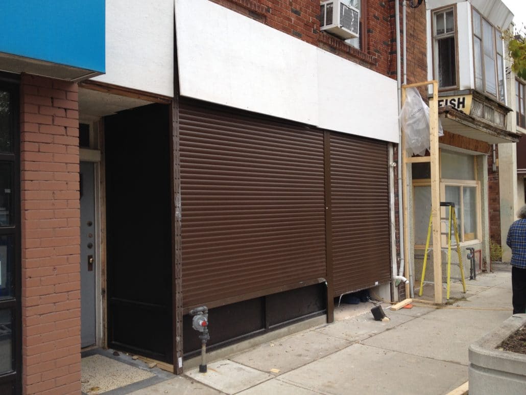 Commercial roll-up shutter on a retail storefront