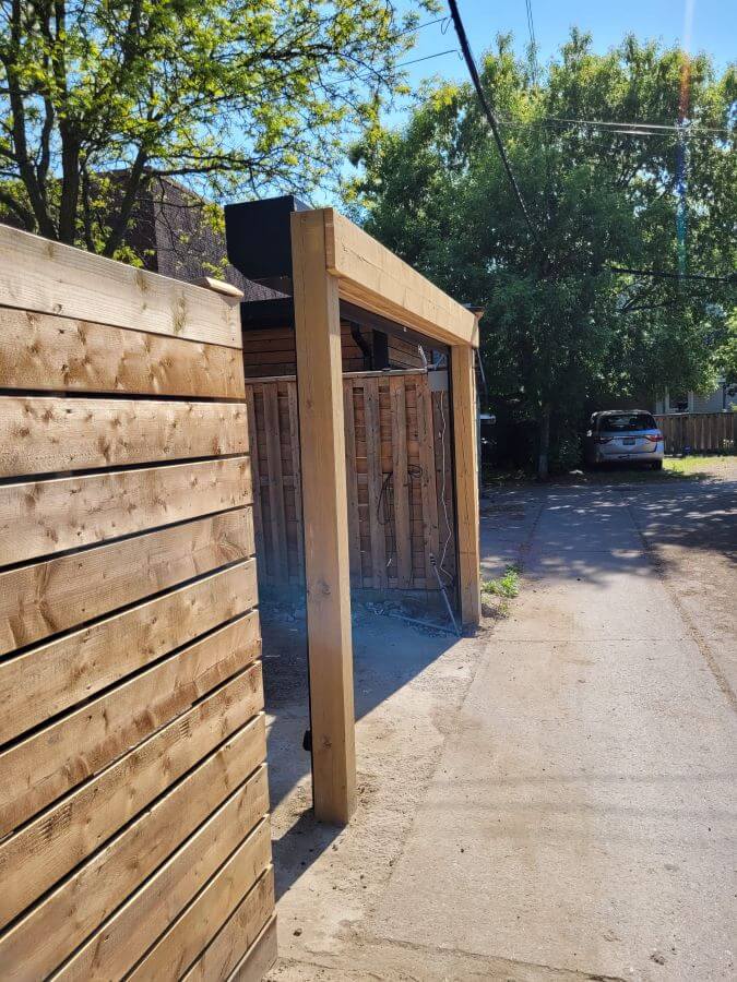 Roll-up shutter installed on a custom-built laneway garage frame