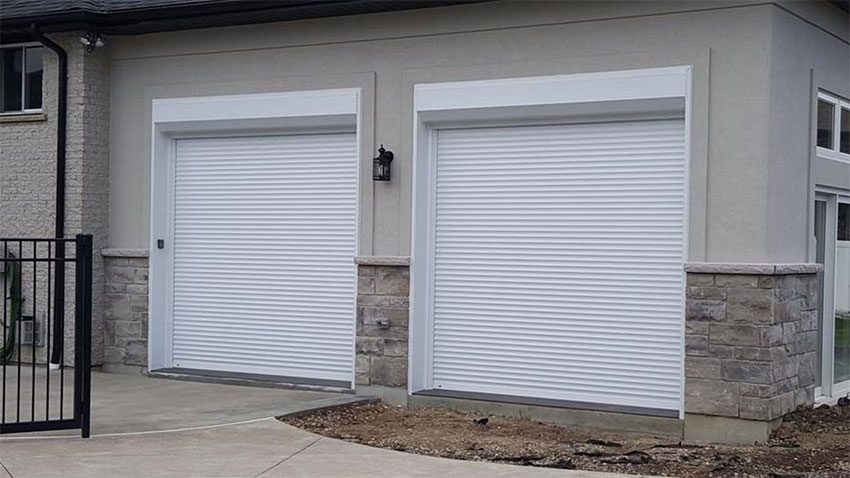 White roll-up security garage door on a residential property