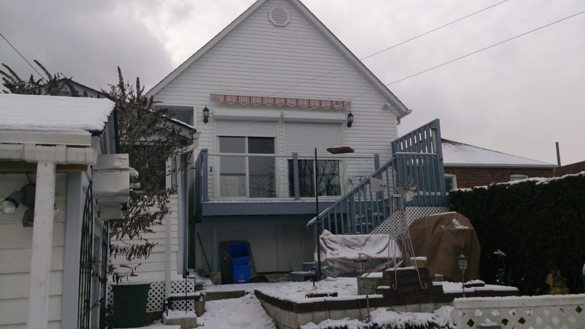 Roll-up window shutters in closed position on a residential home